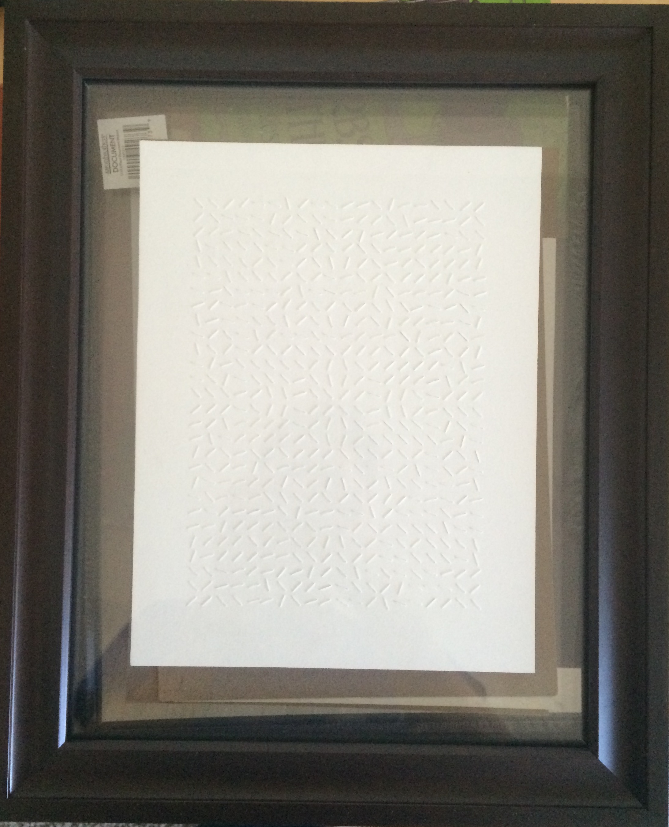 Using a utility knife to cut out uniformly-sized vectors. I liked the way this caught the light and cast shadows.